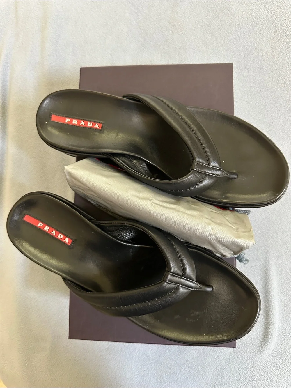 Prada Black Leather Ladies Thong Sandals with Red Logo, dust bag, Size 38. US 8